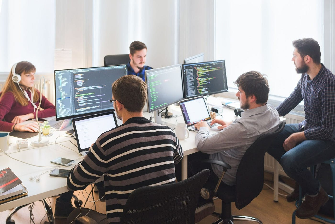 Tech Minds team collaborating in an office
